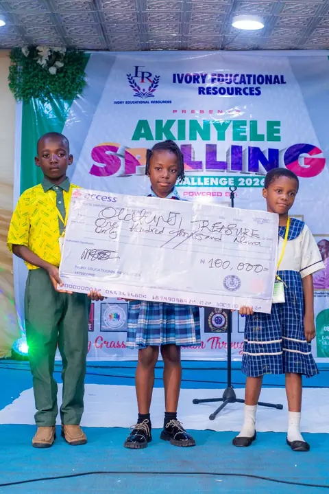 Champion receiving the grand prize cheque