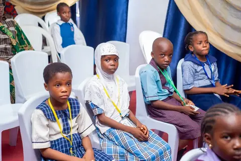 Young participants enjoying the spelling challenge