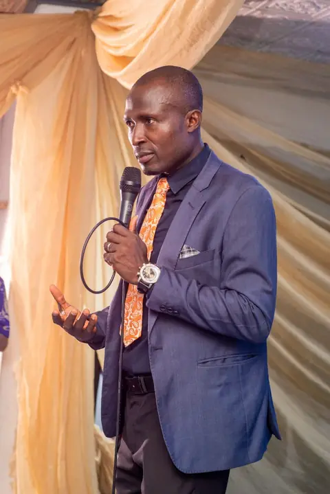 Guest speaker addressing participants and audience